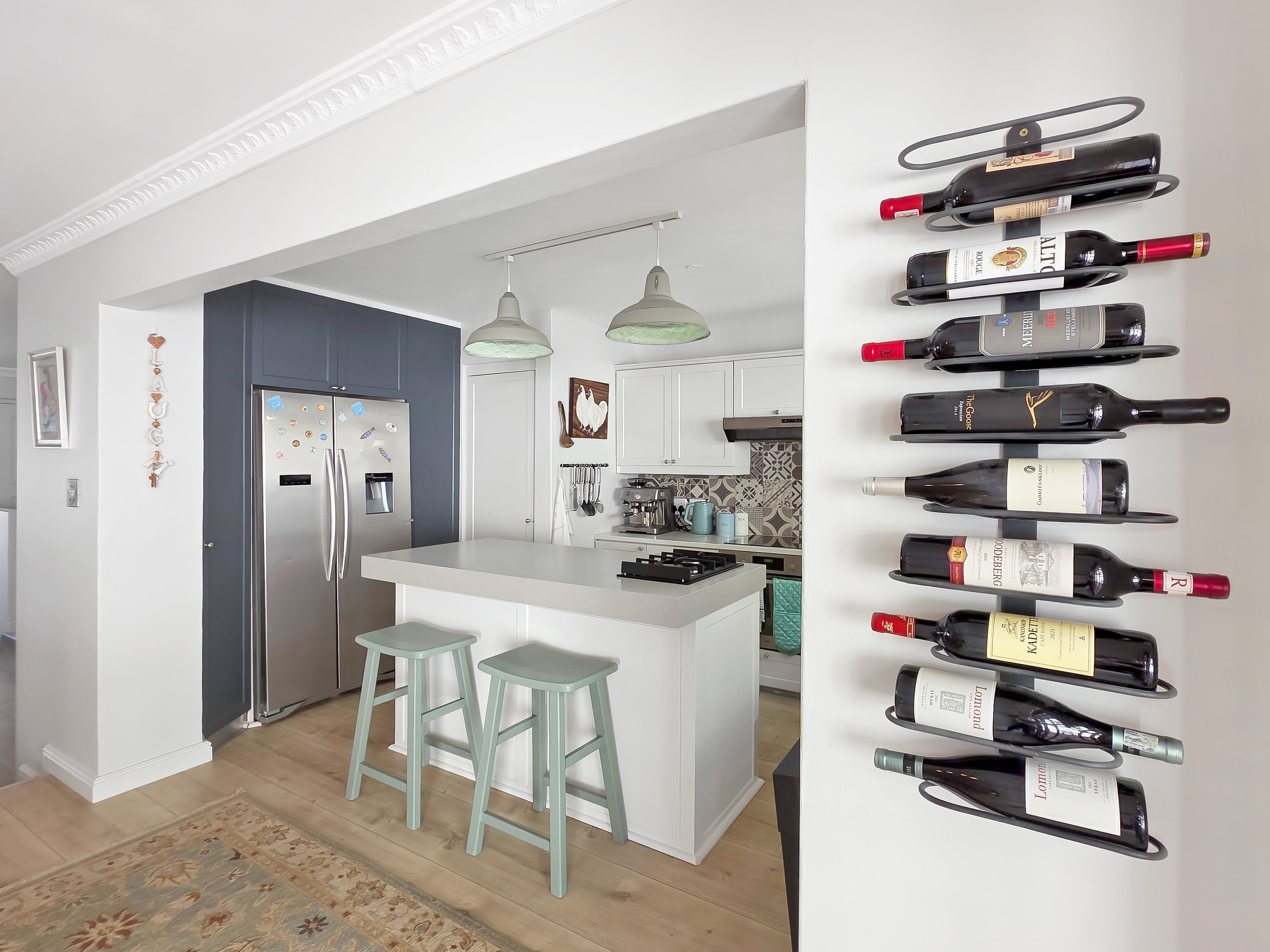 The kitchen and wine rack.