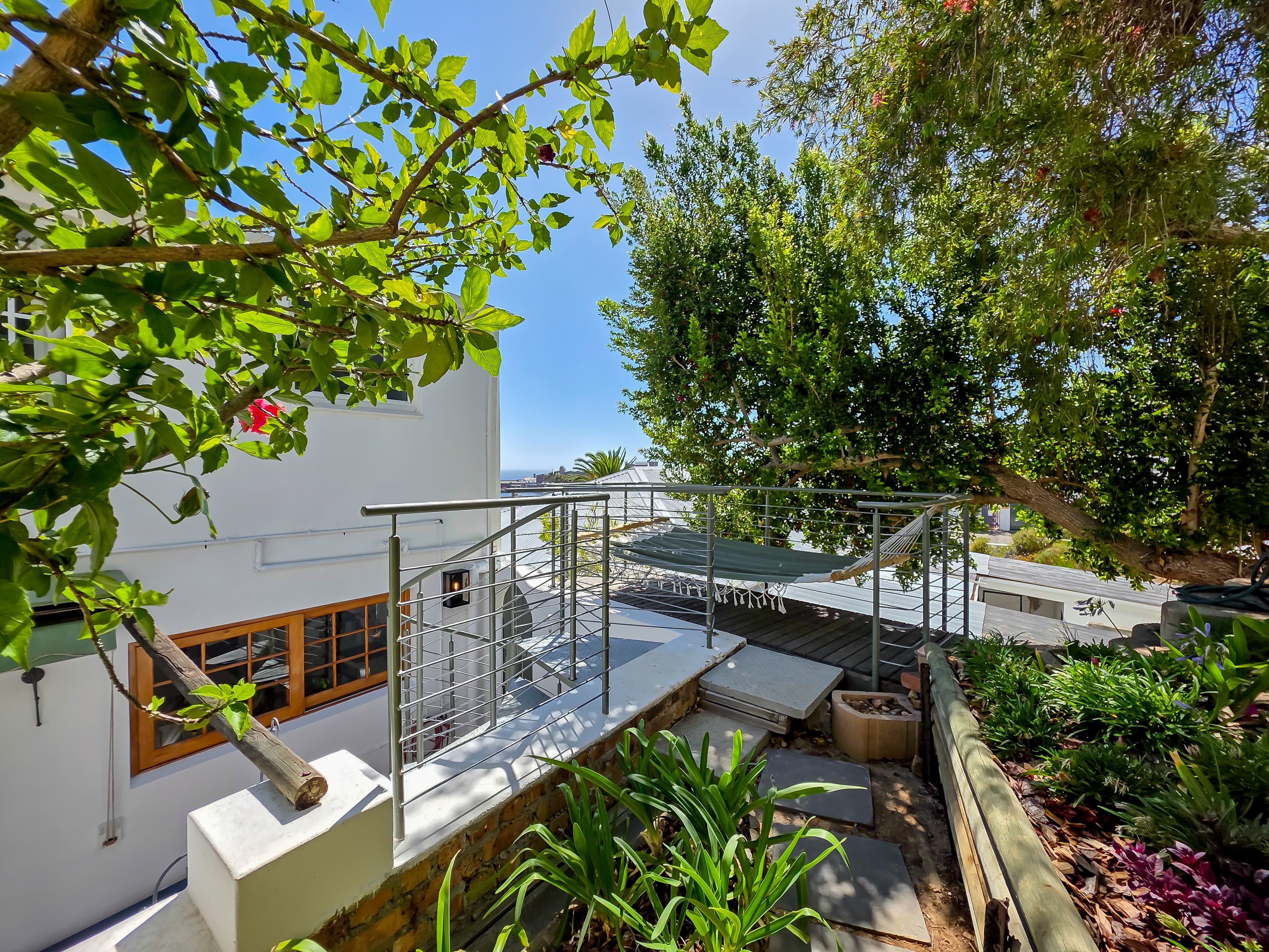 The spiral staircase built by Allen Hardiman, leading to his hammock deck.